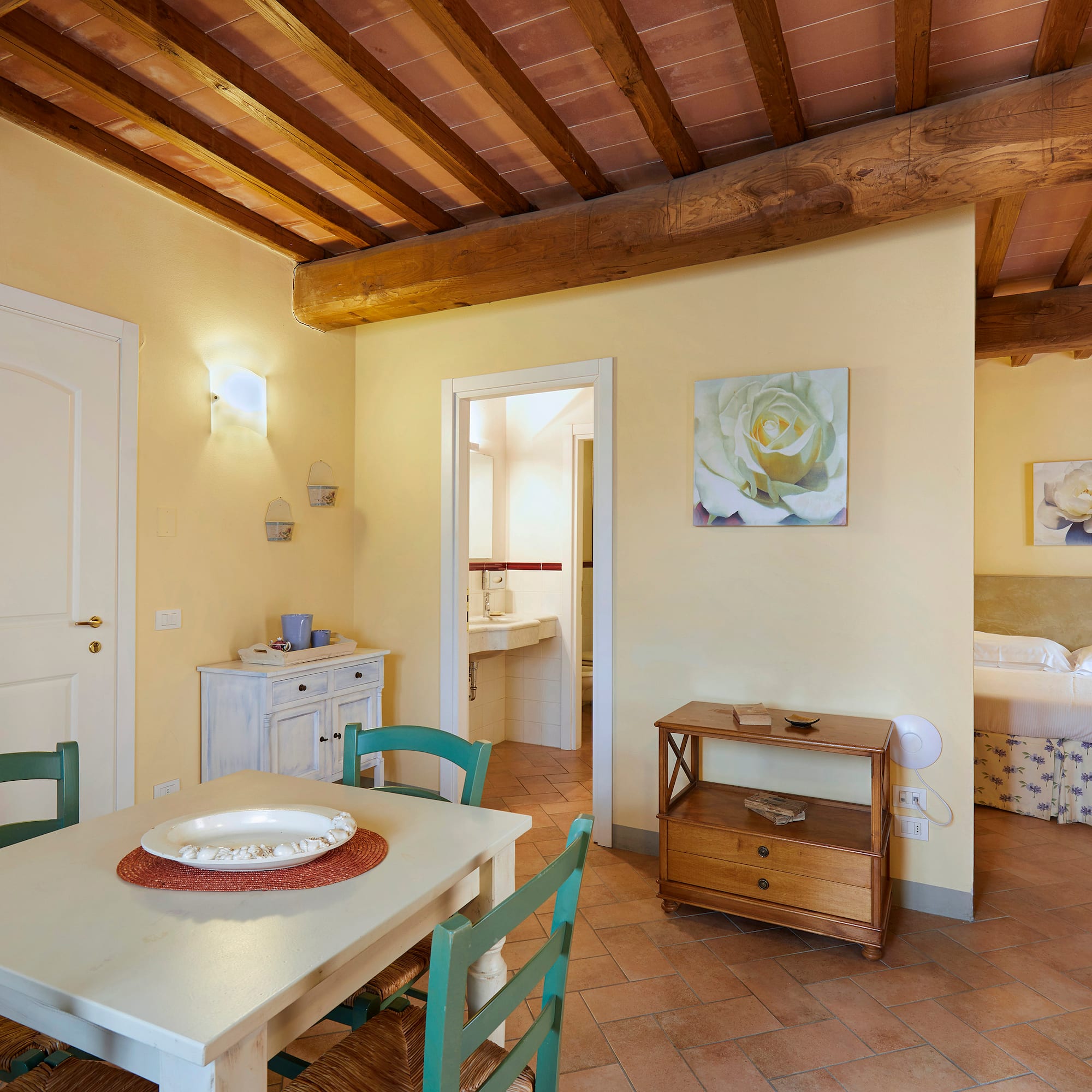 a room with a table and chairs