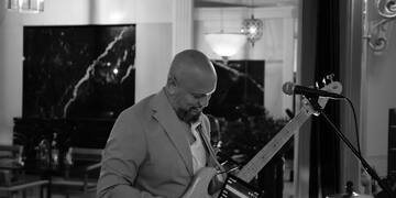 a man playing a guitar