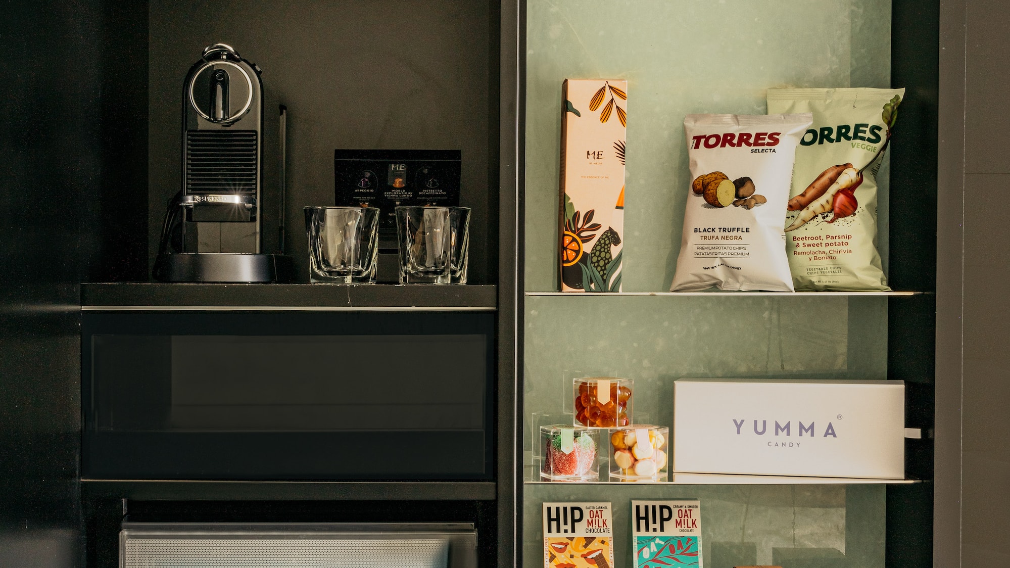 a shelf with food and drinks on it