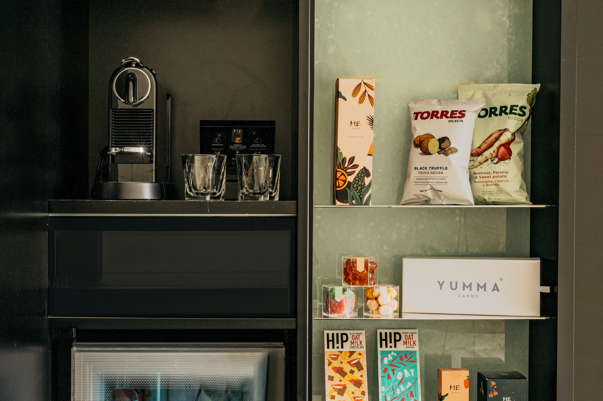 a shelf with food and drinks on it