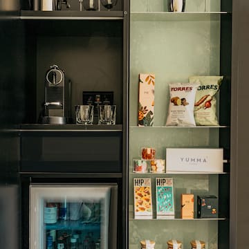 a shelf with food and drinks on it