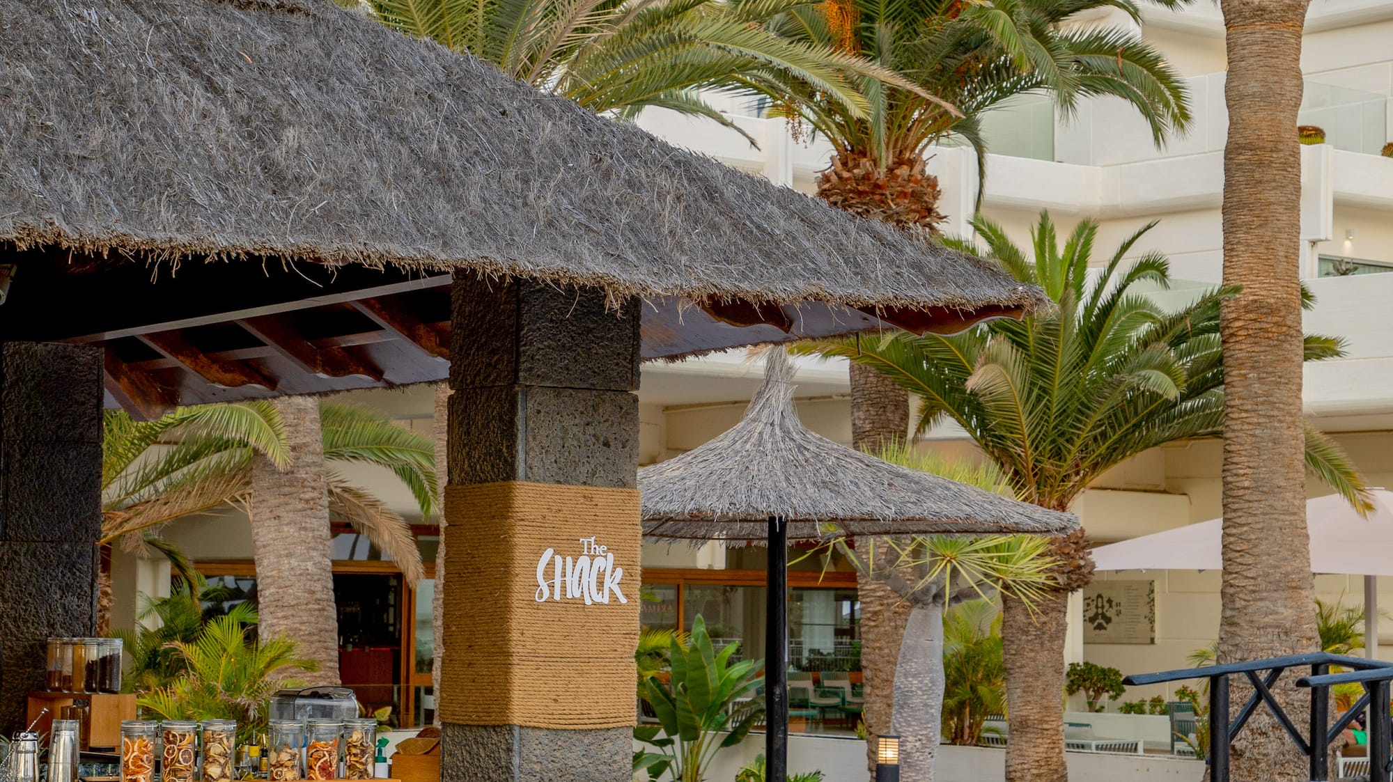 a building with palm trees