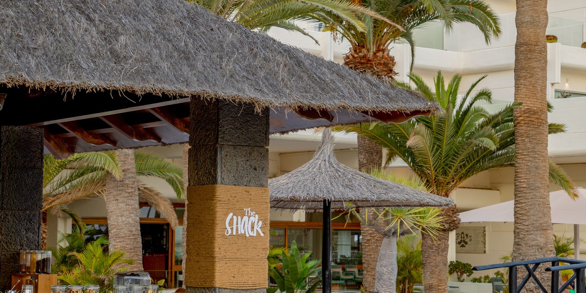 a building with palm trees