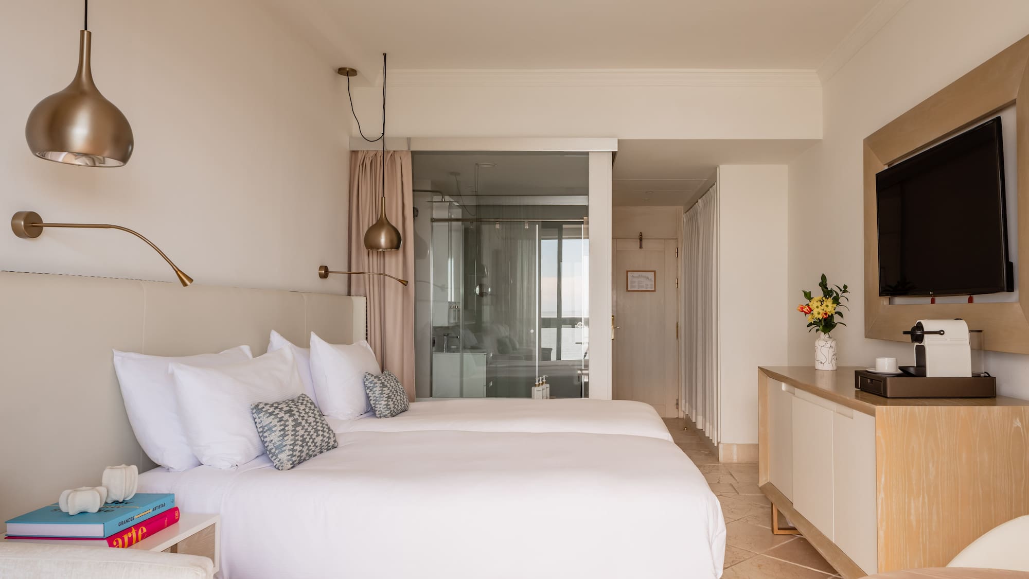 a bedroom with two beds