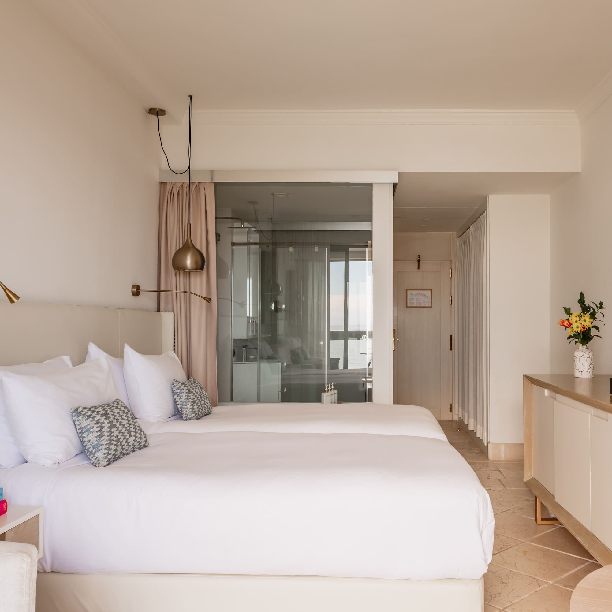 a bedroom with two beds