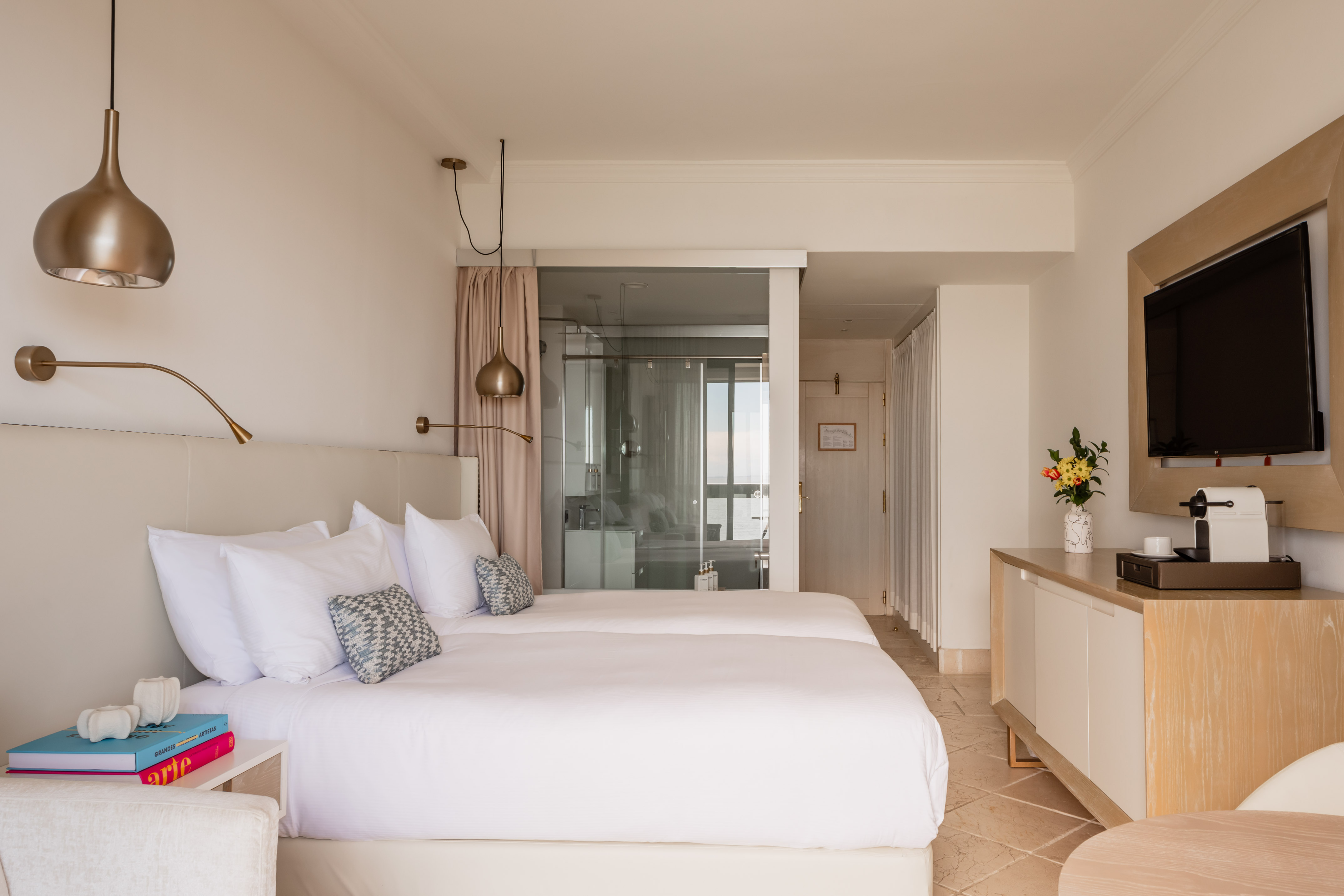 a bedroom with two beds