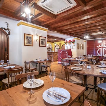 a room with tables and chairs