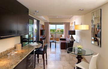 a room with a table and chairs