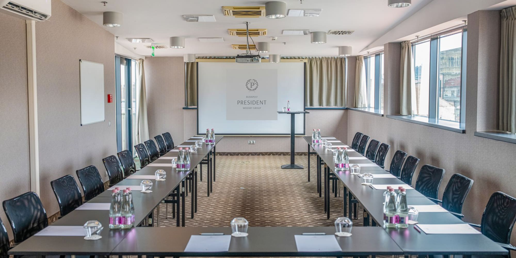 a room with tables and chairs