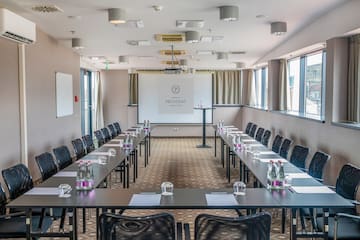 a room with tables and chairs