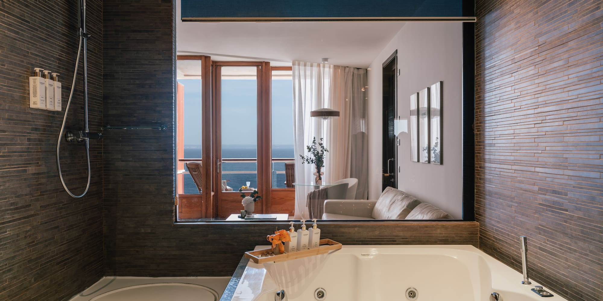 a bathroom with a bathtub and a shower