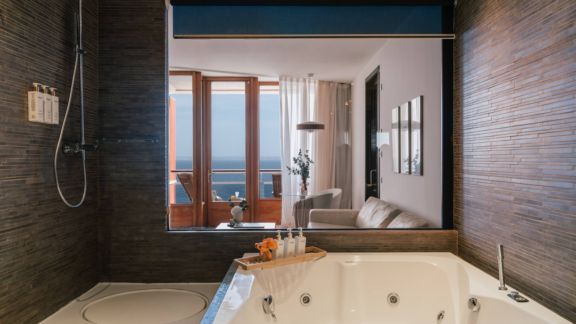 a bathroom with a bathtub and a shower