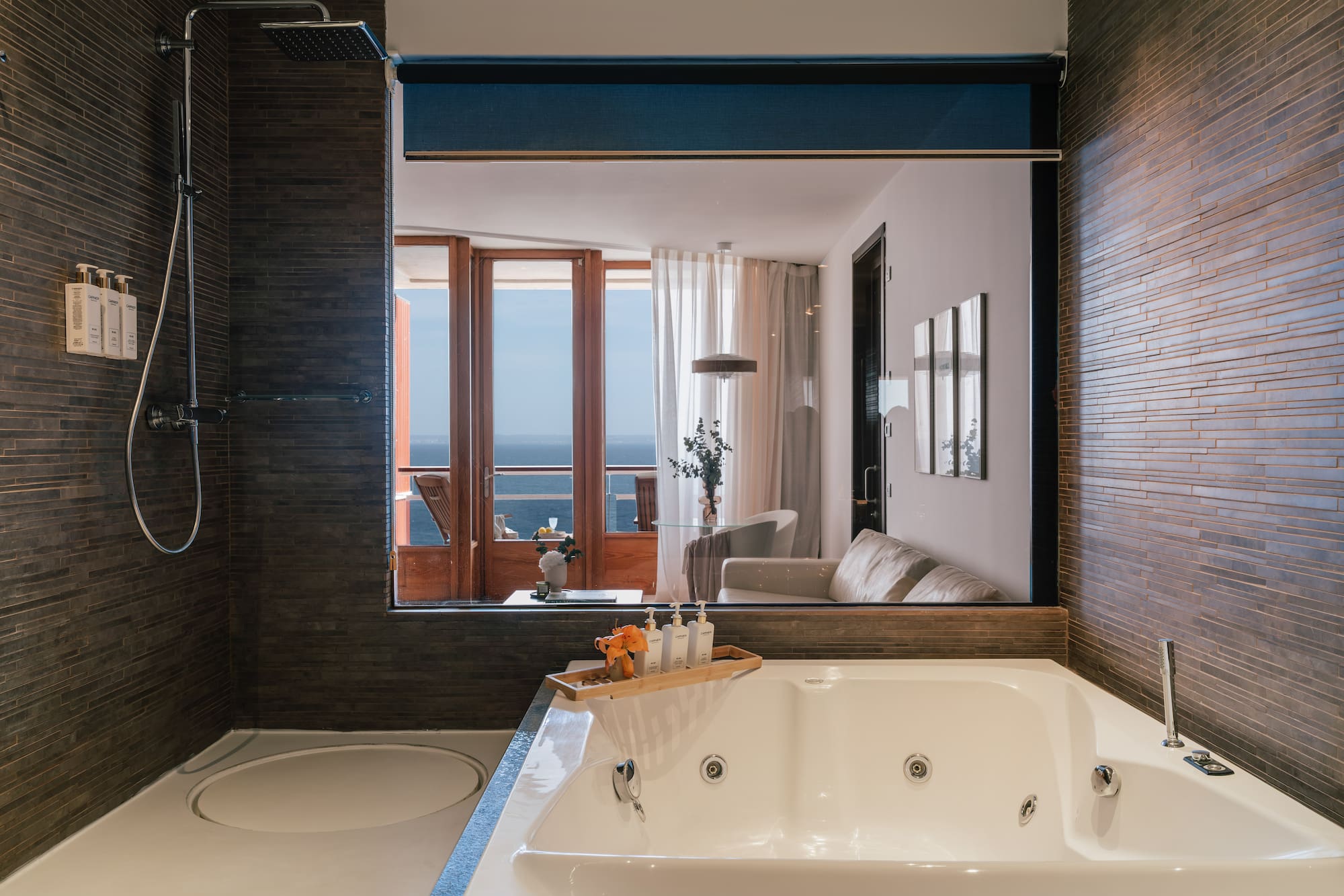 a bathroom with a bathtub and a shower