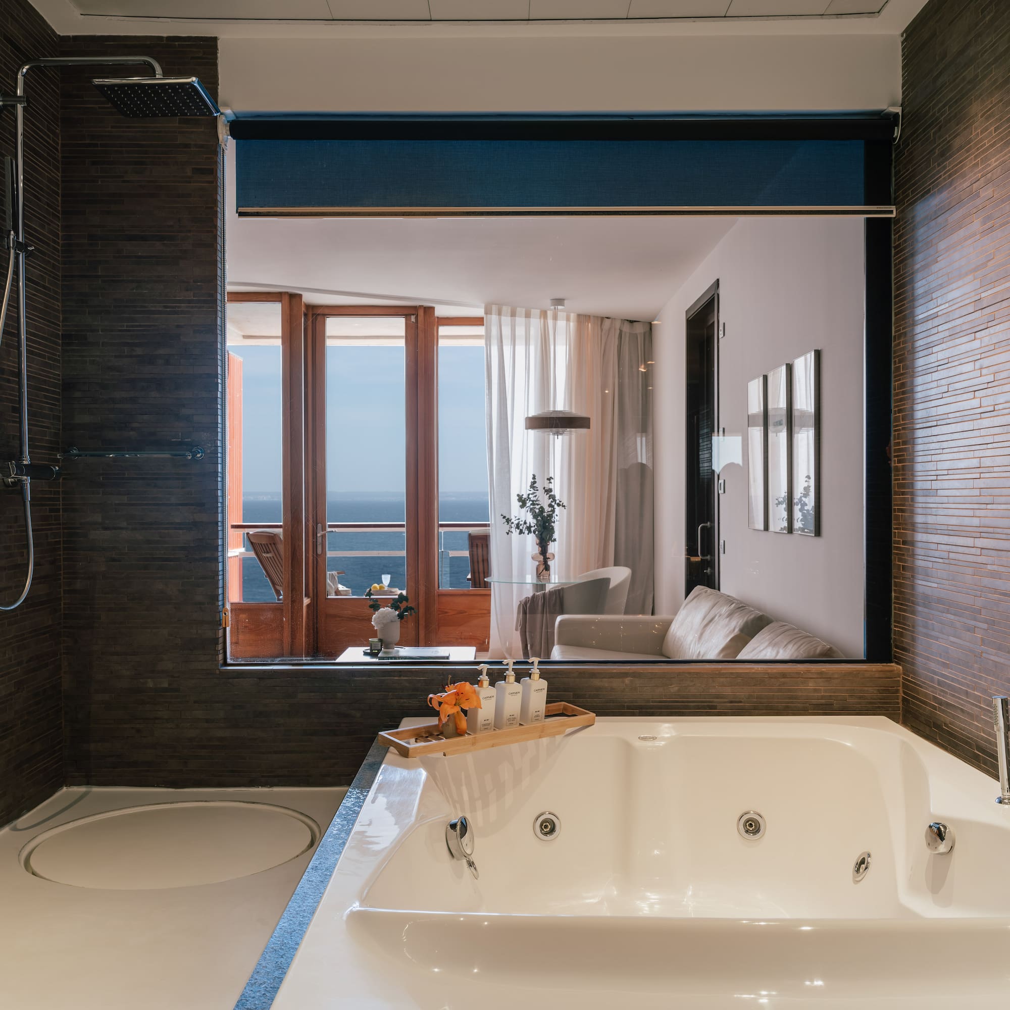 a bathroom with a bathtub and a shower