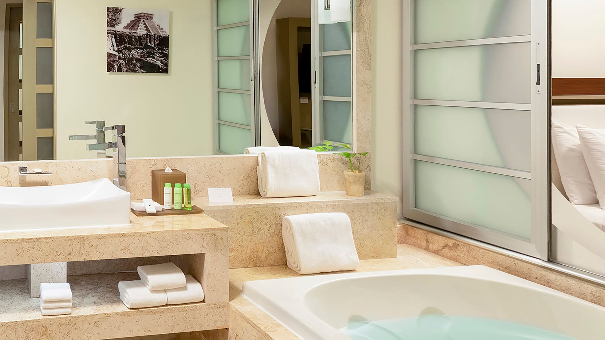 a bathroom with a bathtub and sink