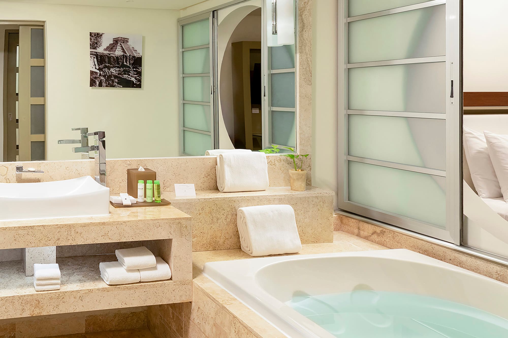 a bathroom with a bathtub and sink