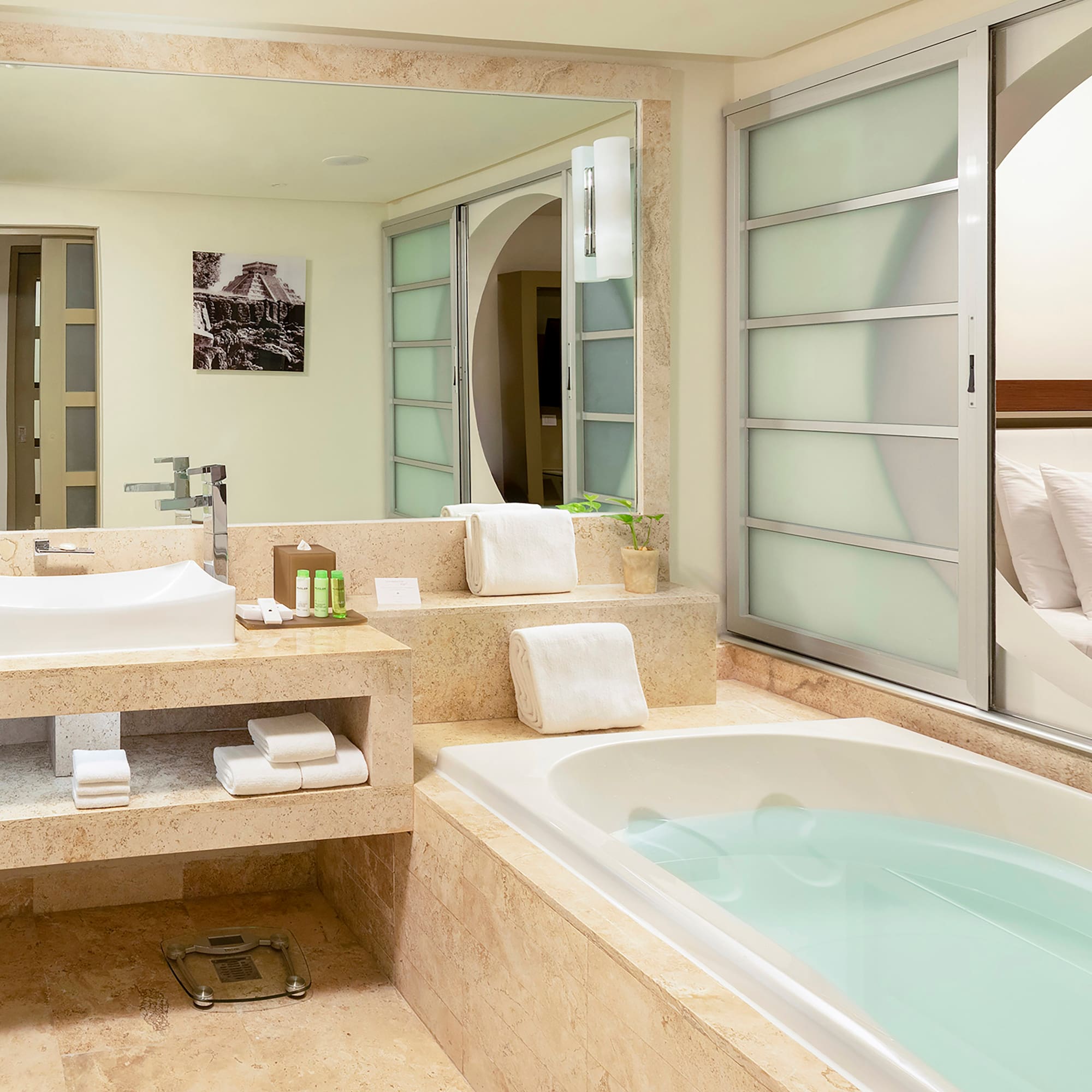 a bathroom with a bathtub and sink