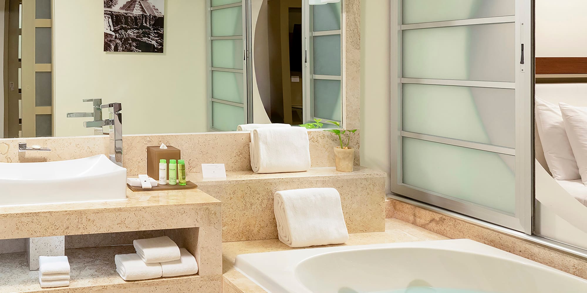 a bathroom with a bathtub and sink