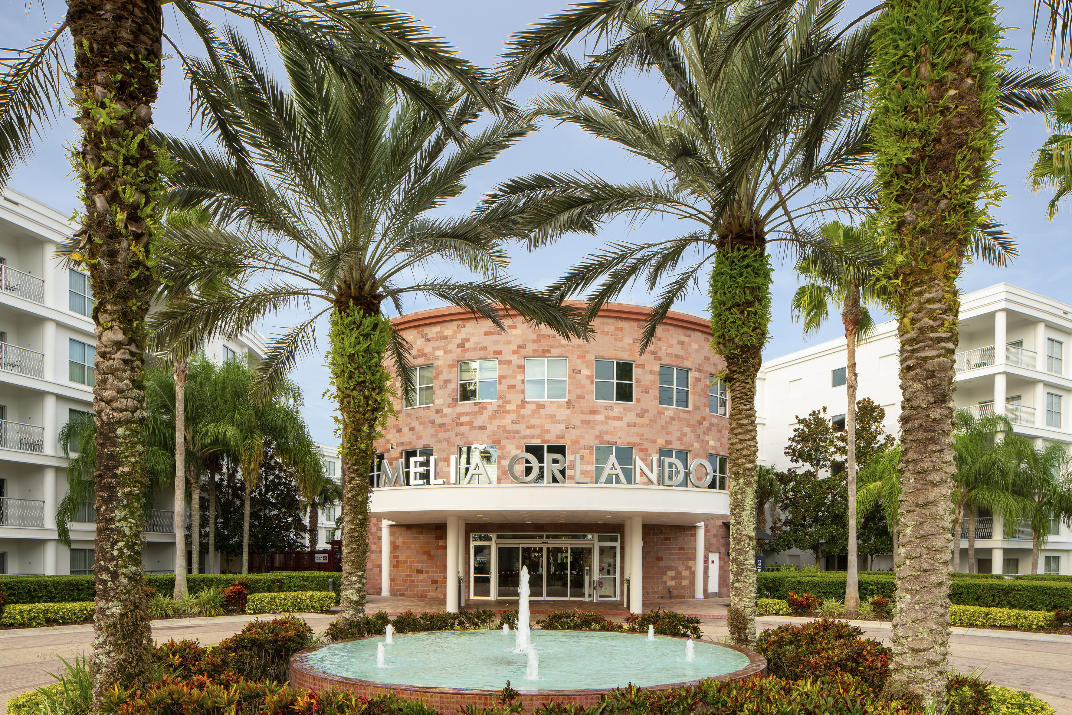 a building with a fountain in front of it