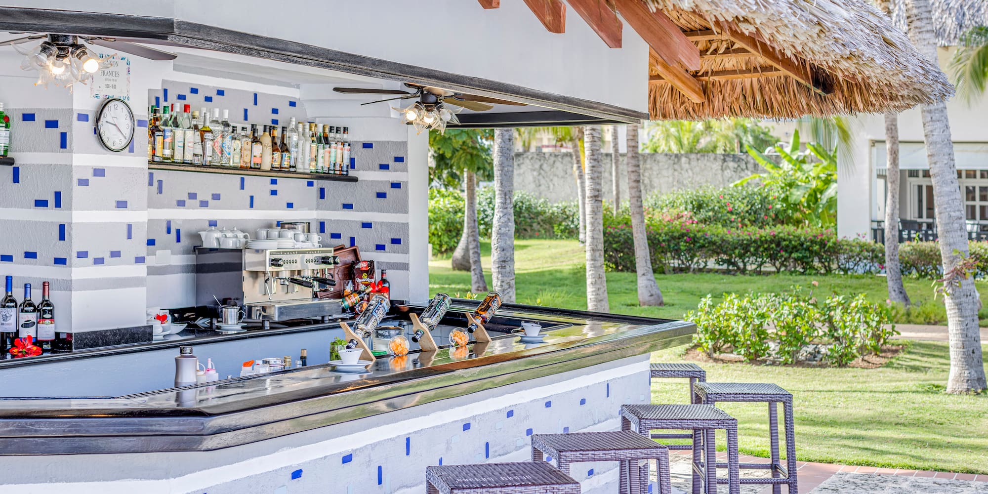 a bar with a stool and a bar counter