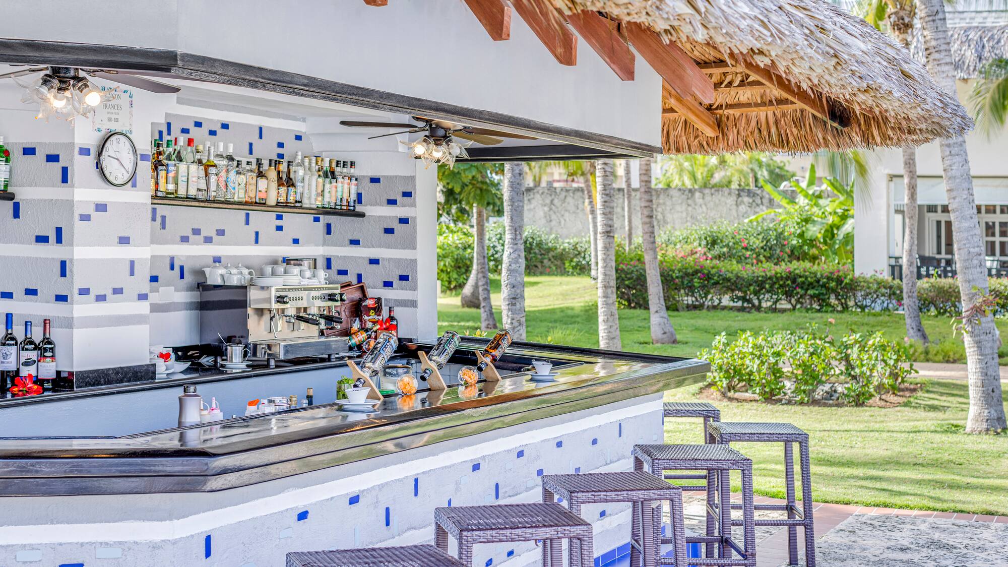 a bar with a stool and a bar counter