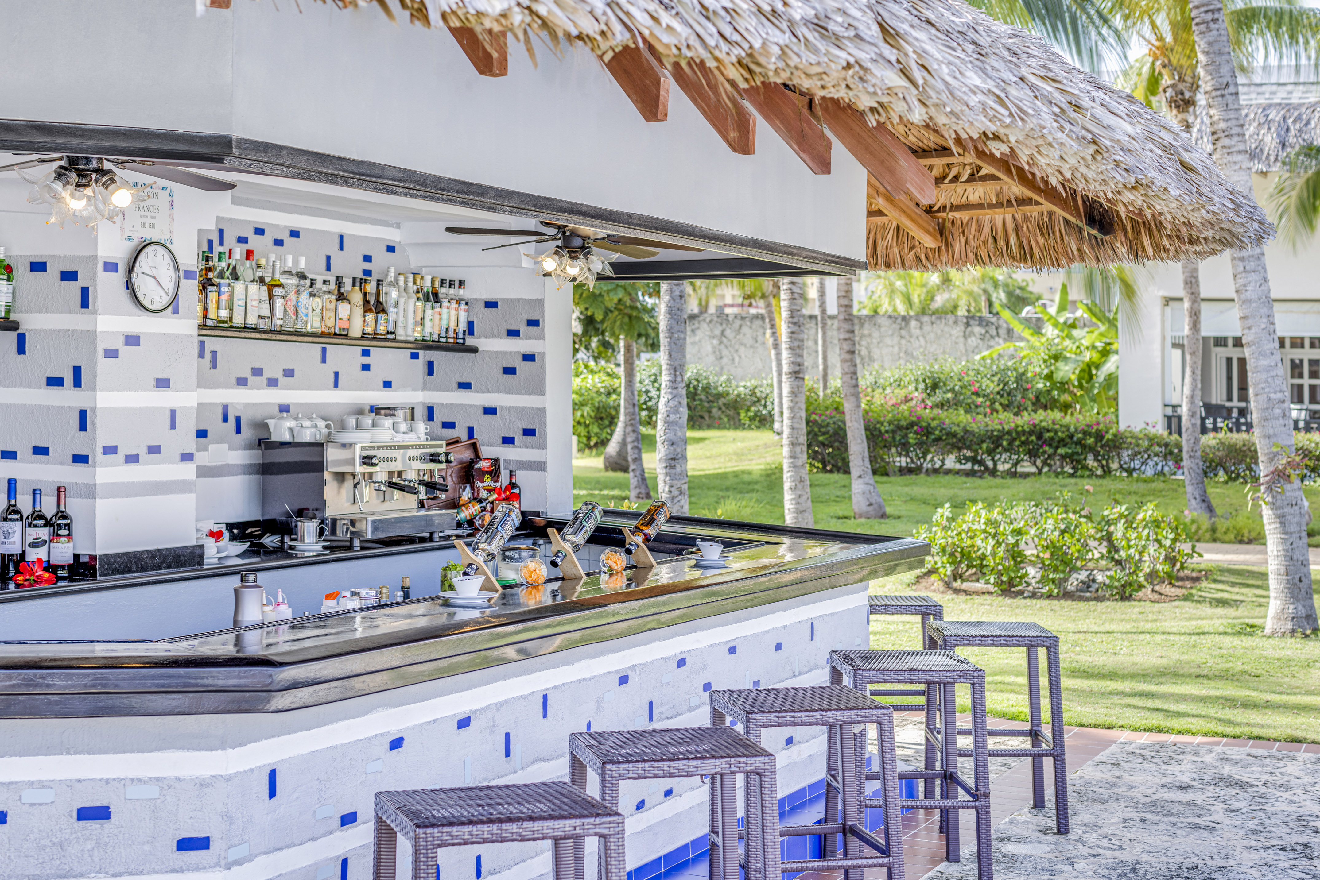 a bar with a stool and a bar counter