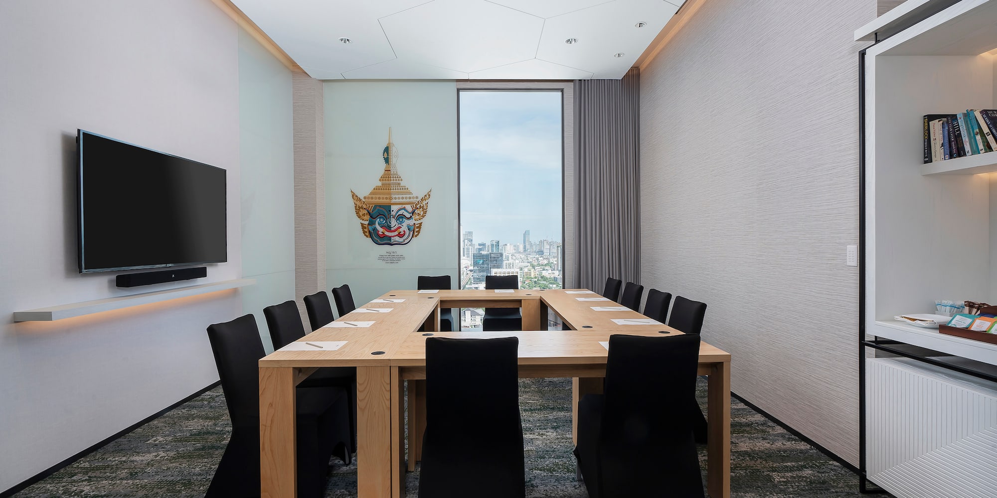 a room with a table and chairs