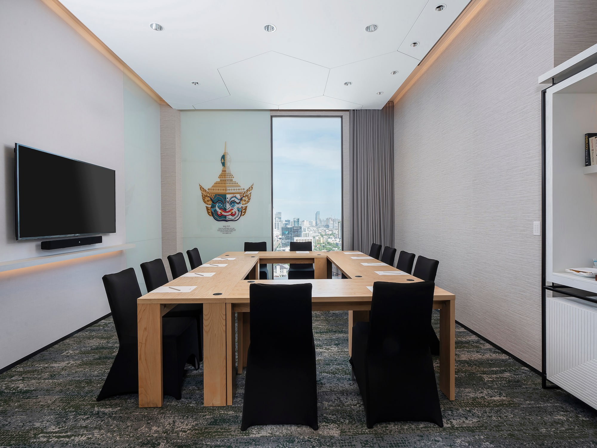 a room with a table and chairs