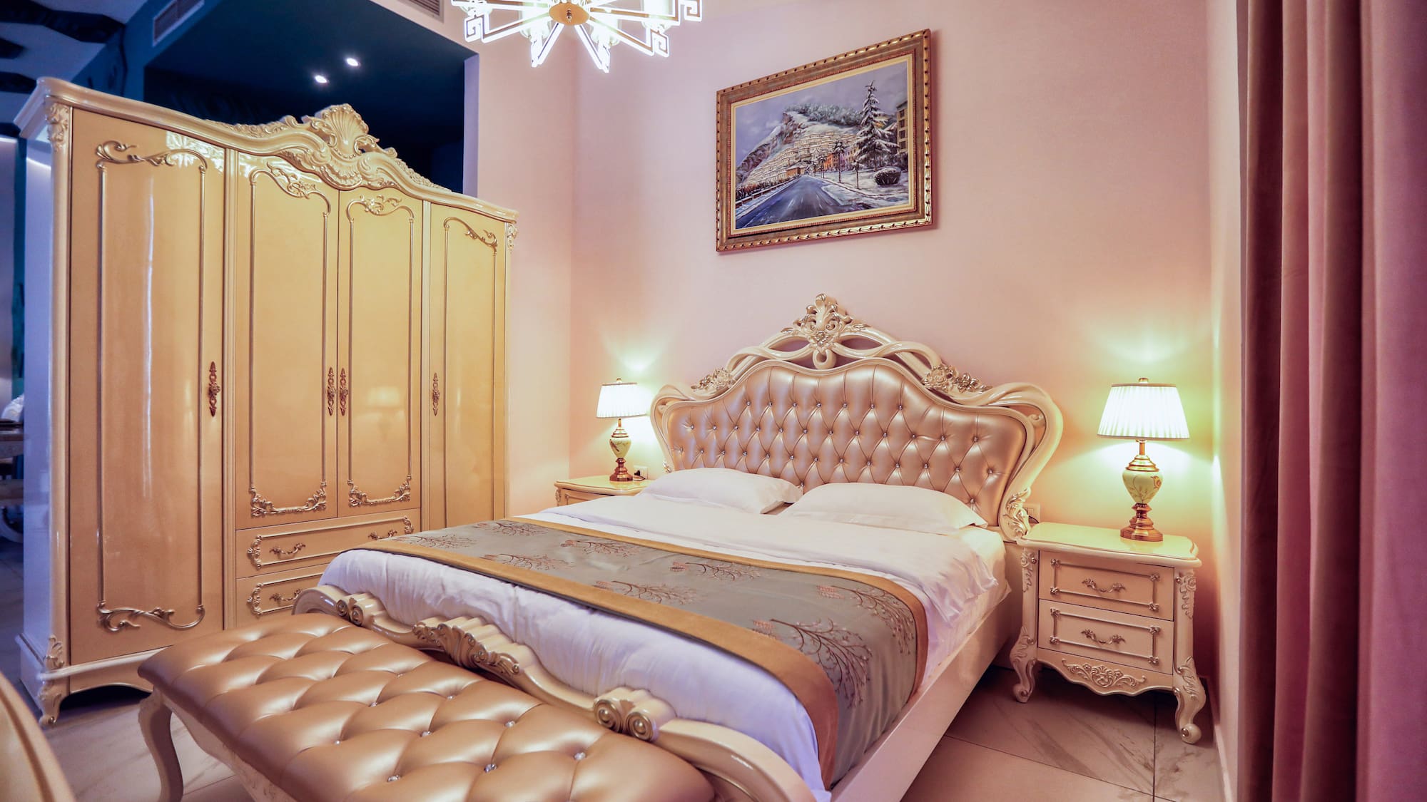 a bedroom with a bed and a mirror