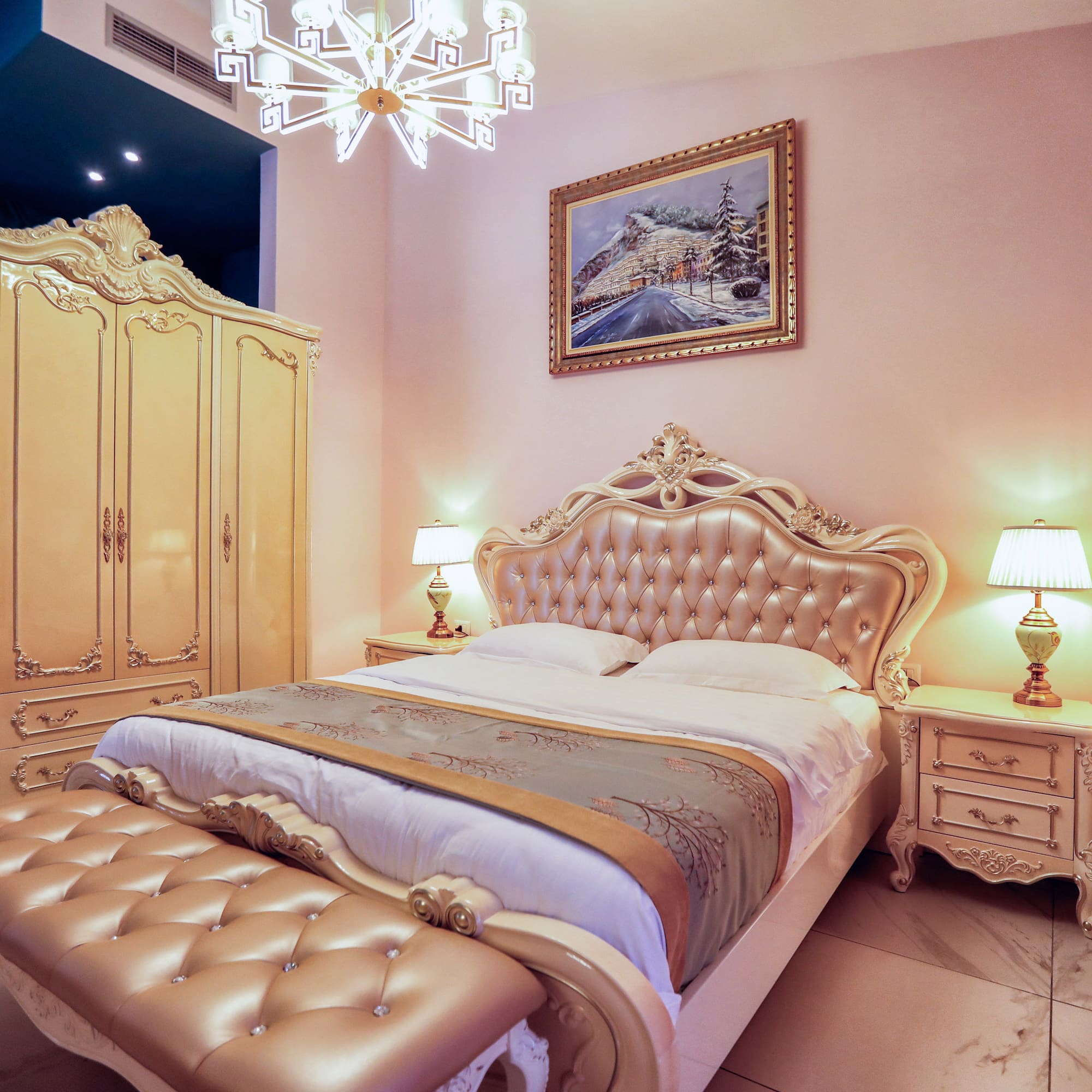 a bedroom with a bed and a mirror