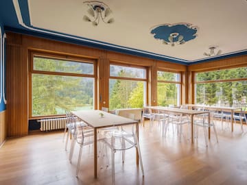 a room with tables and chairs