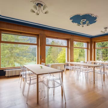 a room with tables and chairs