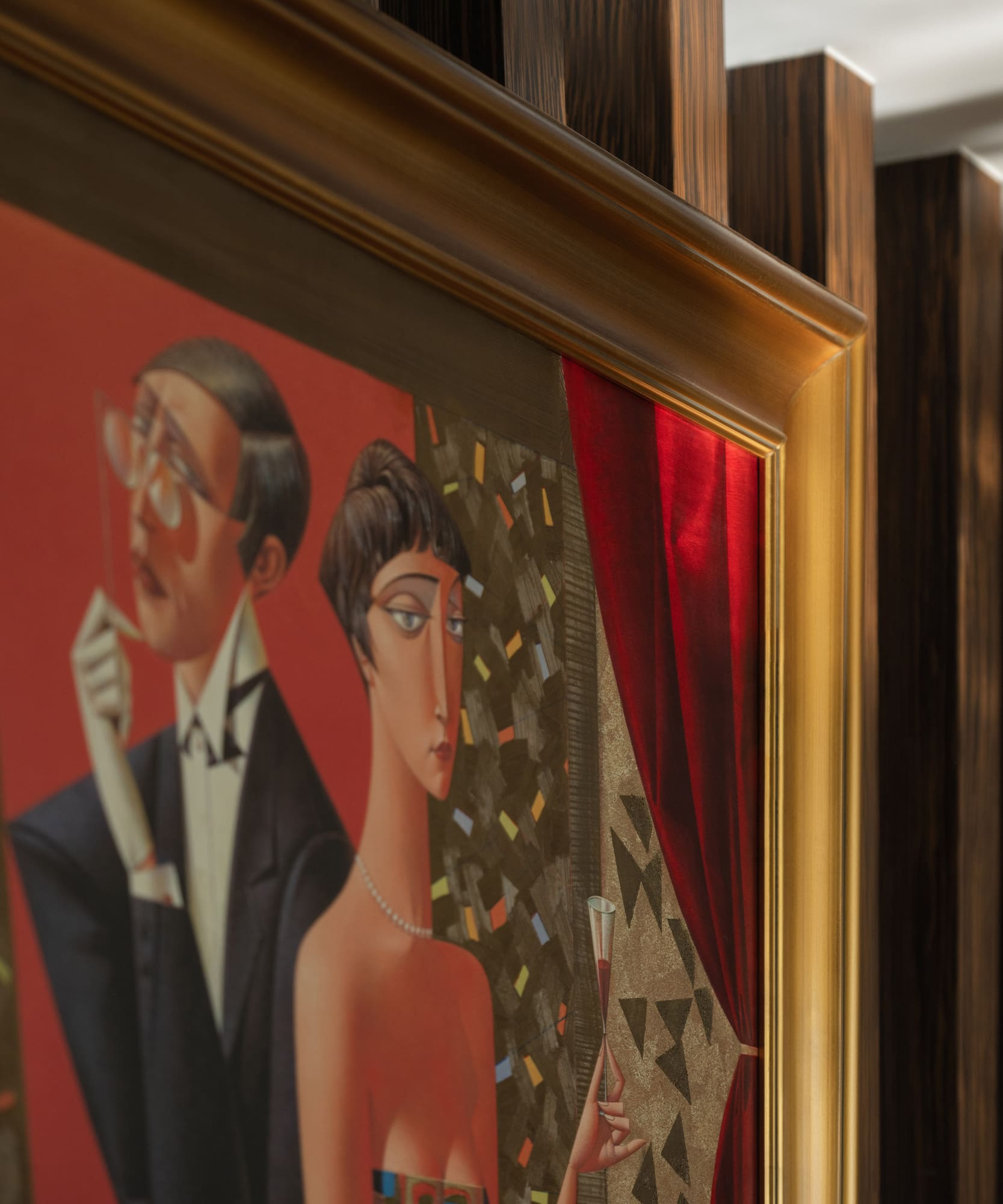 a painting of a man and woman in a gold frame