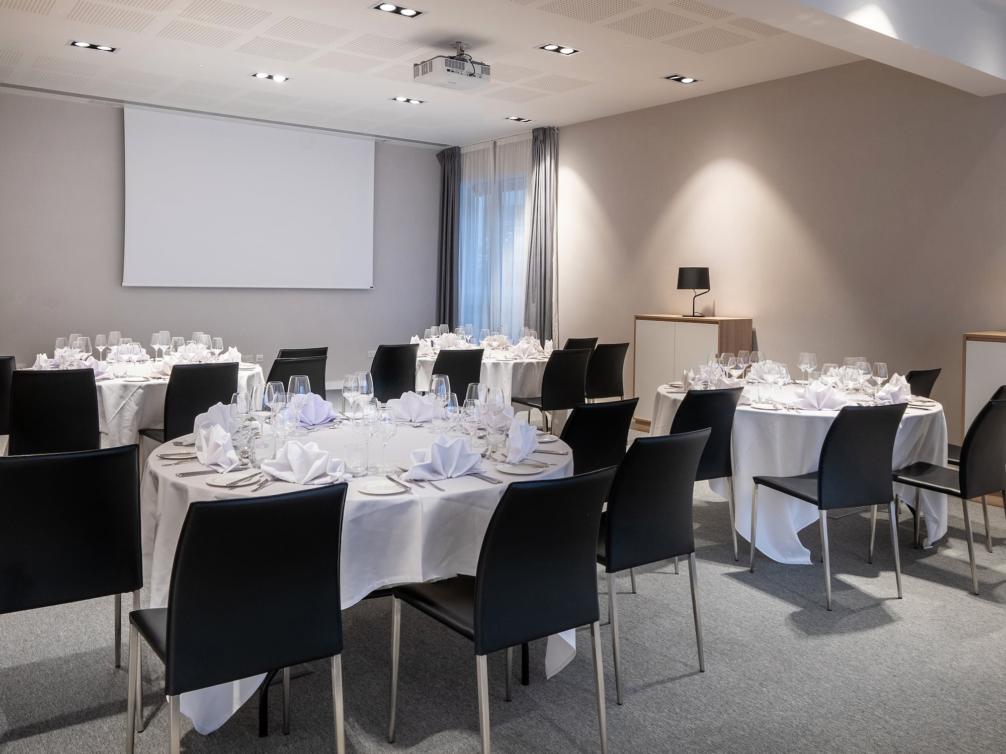 a room with tables and chairs