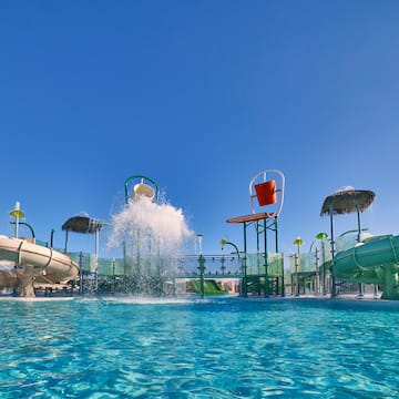 a water park with slides and a water slide