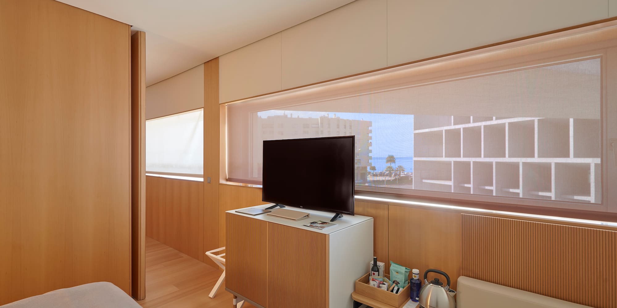 a room with a television and a table