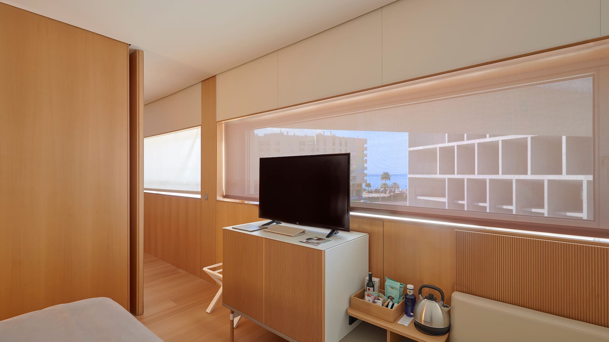 a room with a television and a table