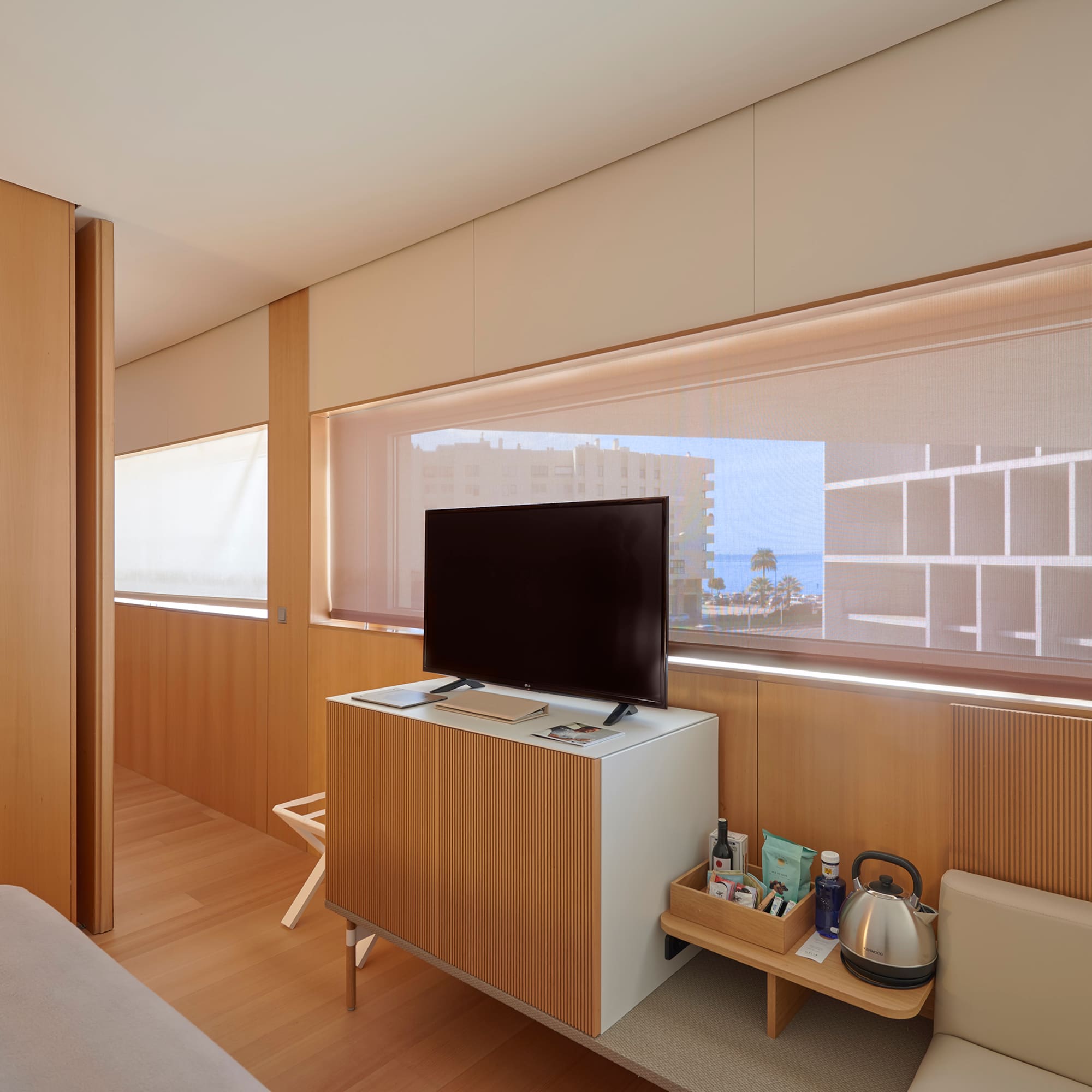 a room with a television and a table