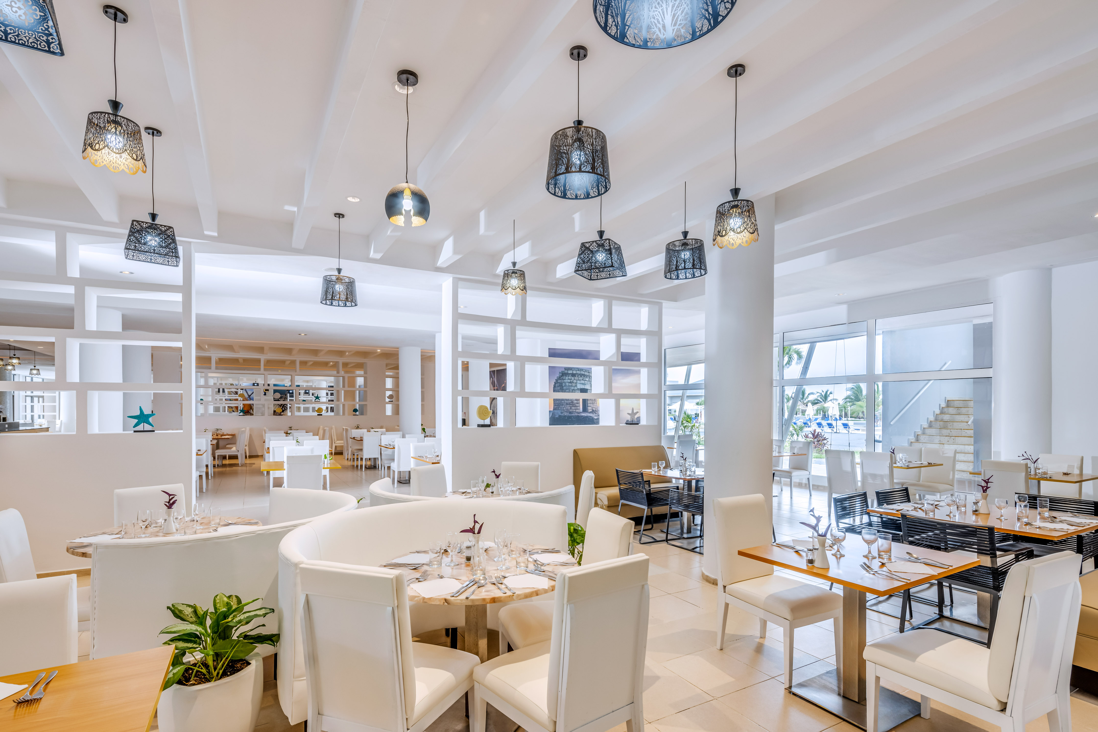 a restaurant with tables and chairs