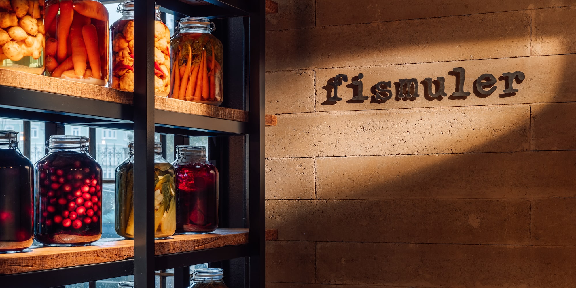 a shelf with jars of food
