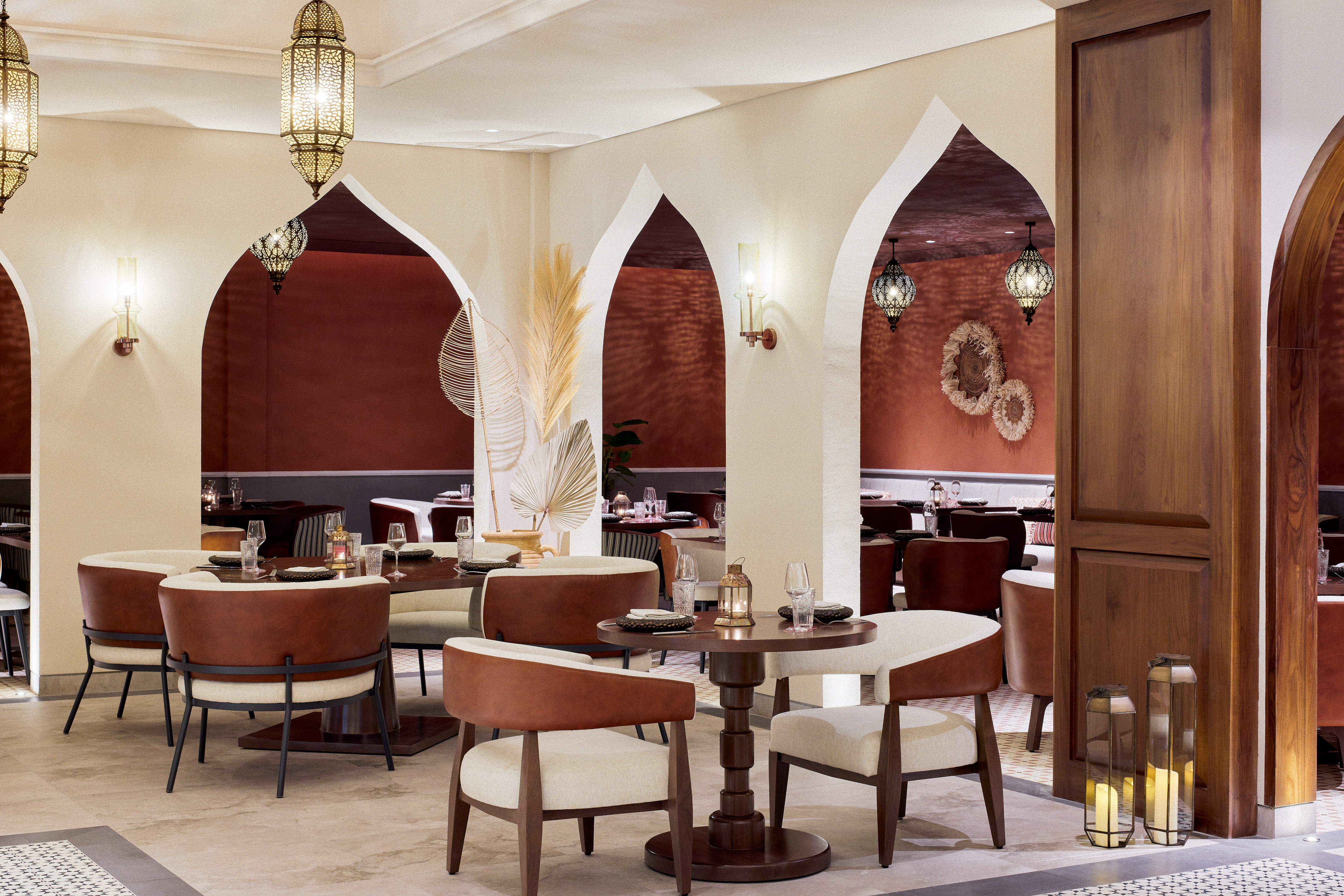 a restaurant with tables and chairs