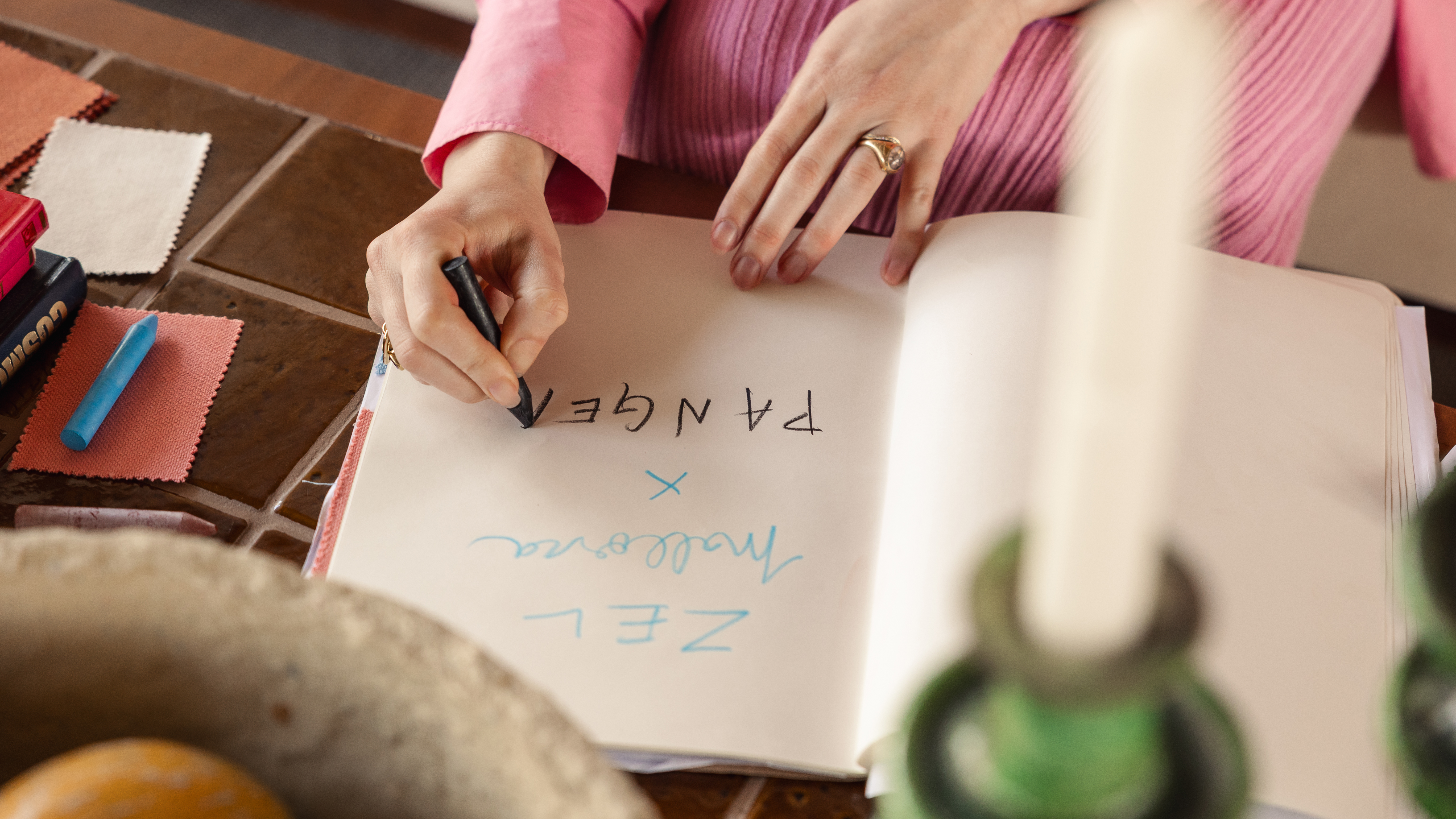 a person writing in a book