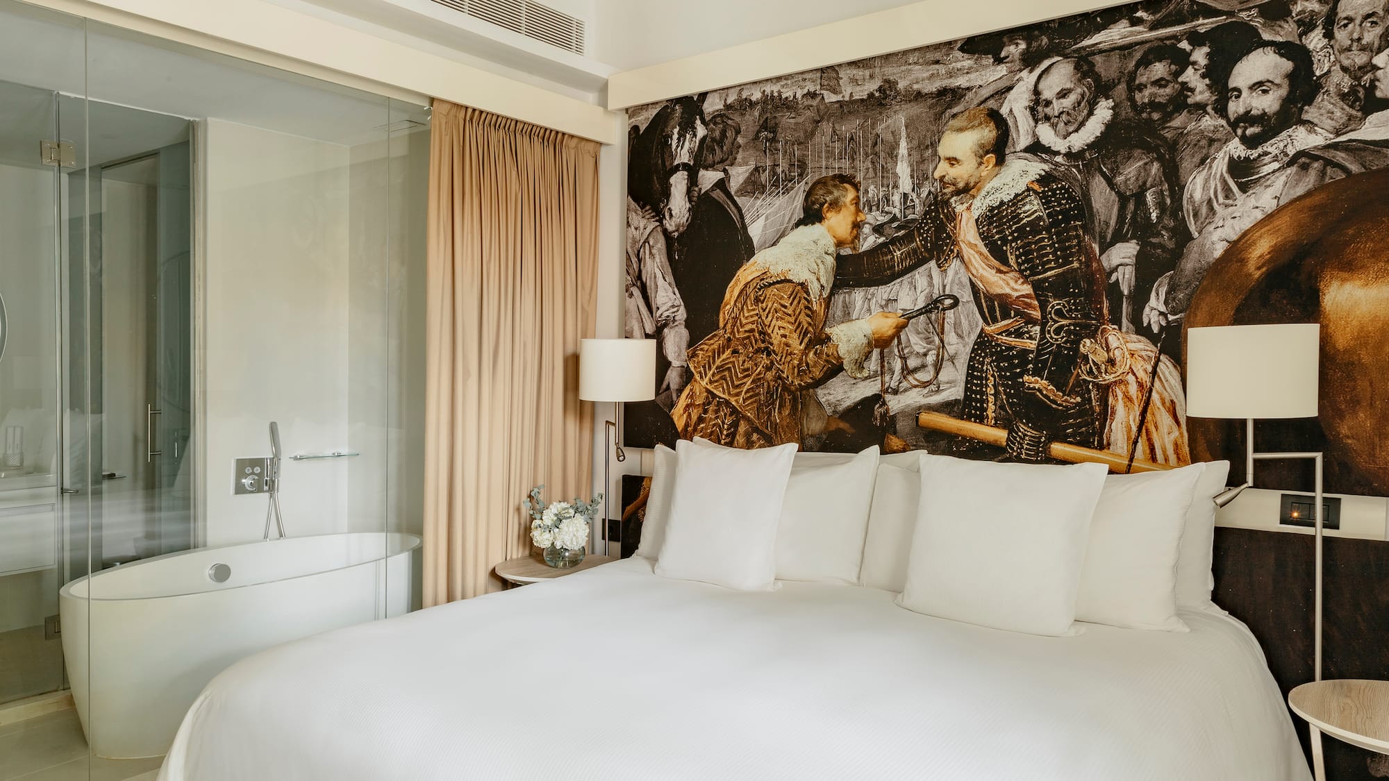 a bed with a picture of men on it