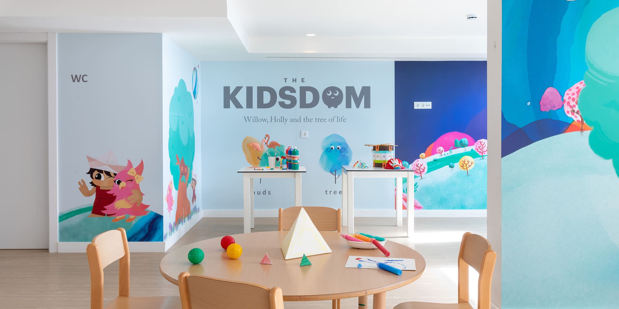 a room with a table and chairs