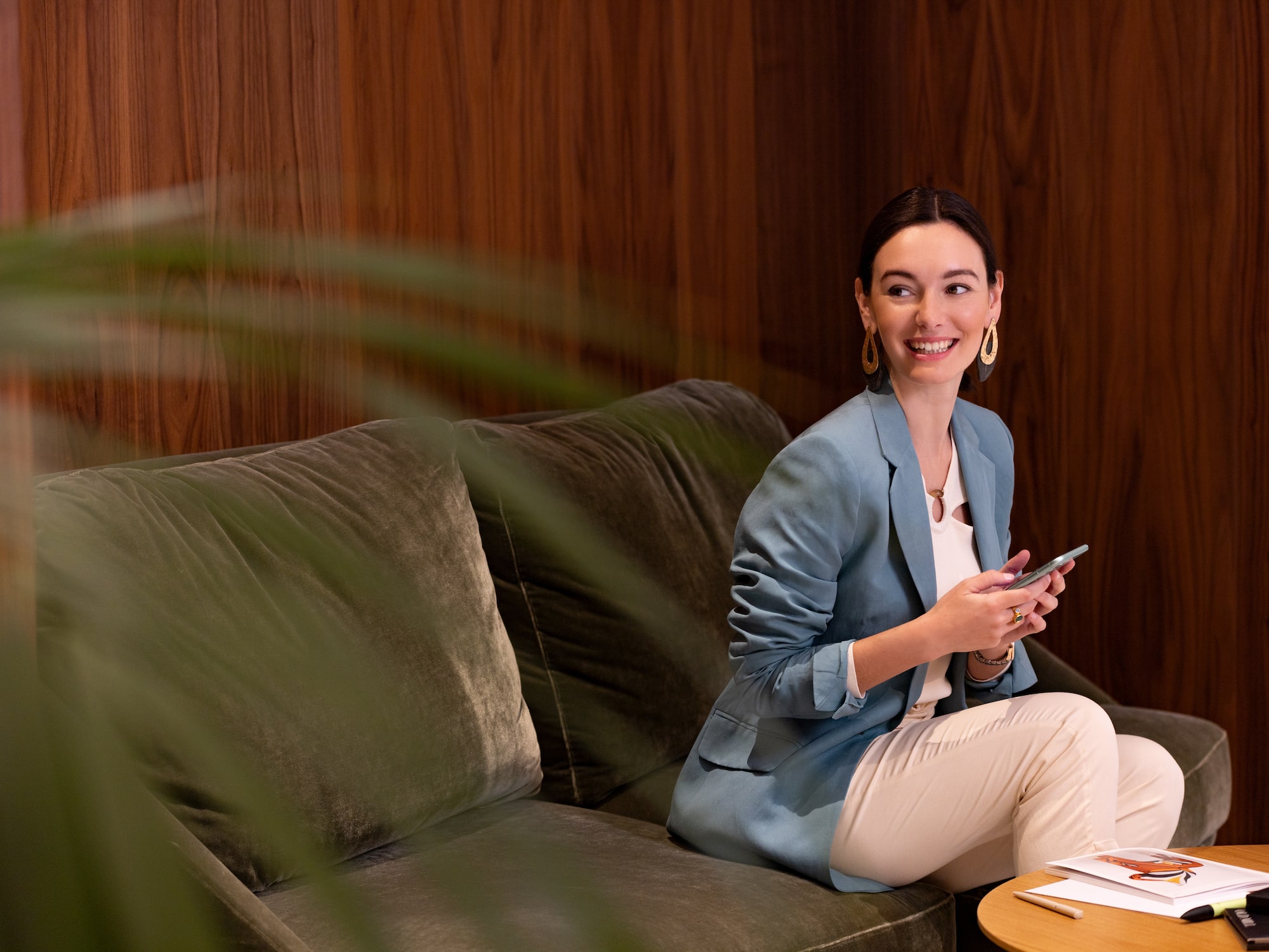 a woman sitting on a couch