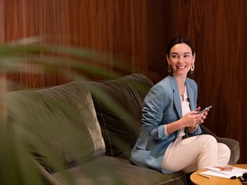 a woman sitting on a couch