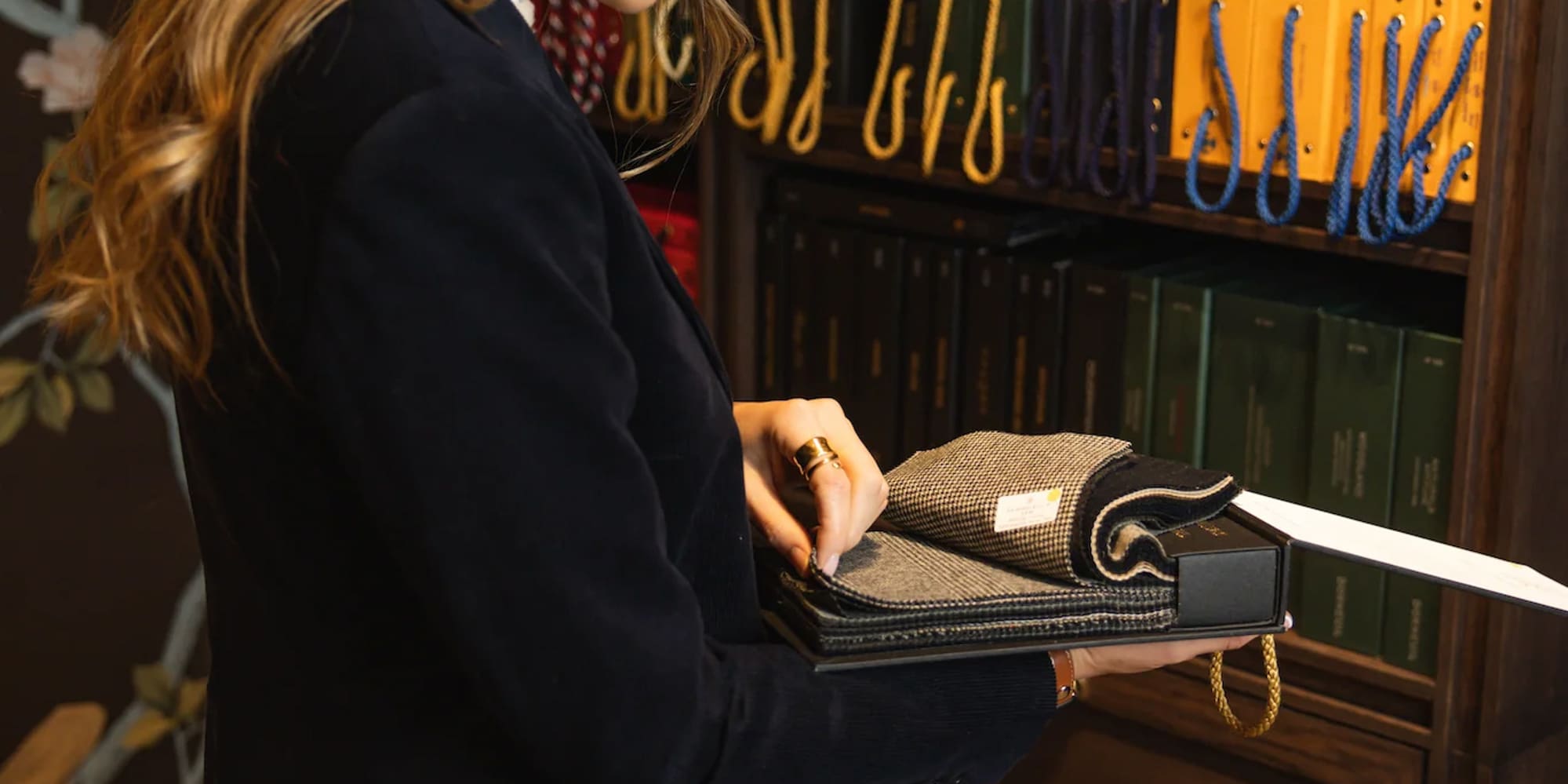 a woman looking at a book