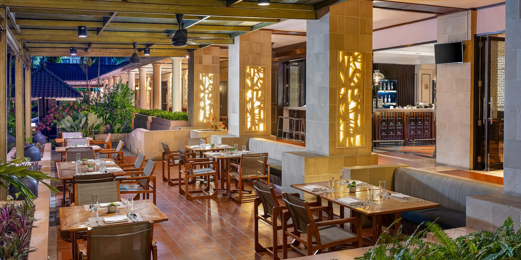 a restaurant with tables and chairs