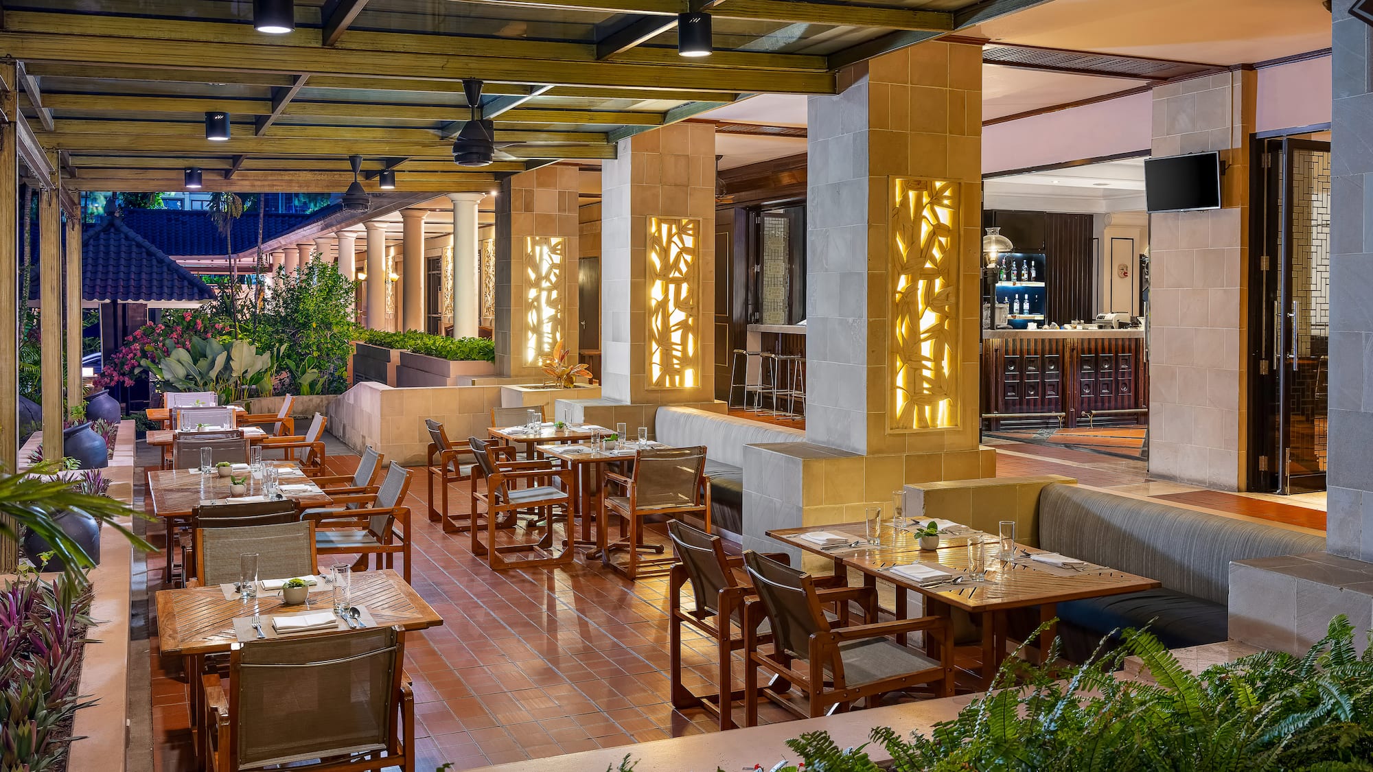 a restaurant with tables and chairs