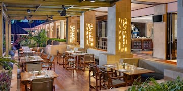 a restaurant with tables and chairs